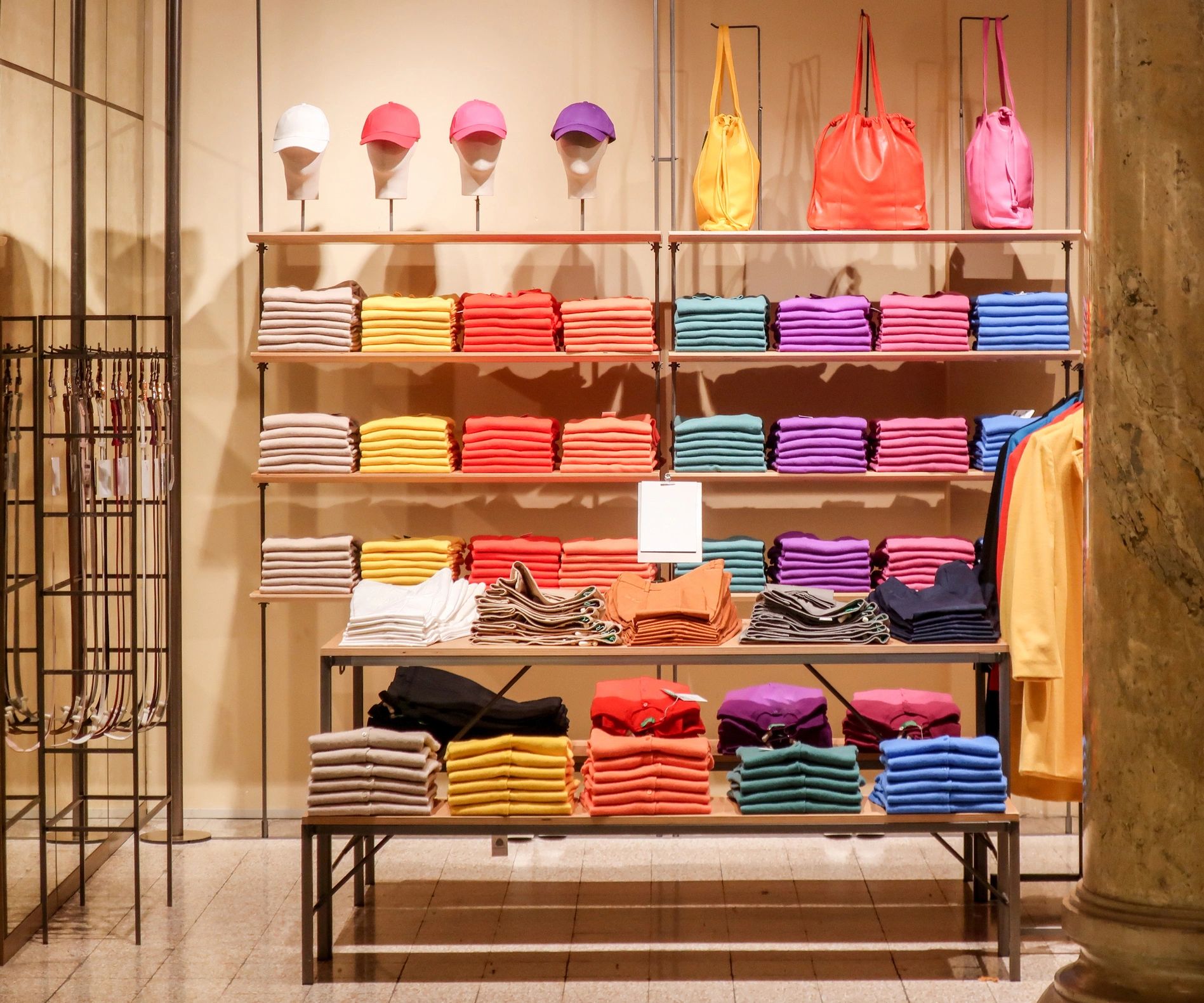 Boutique clothing display featuring neatly arranged apparel