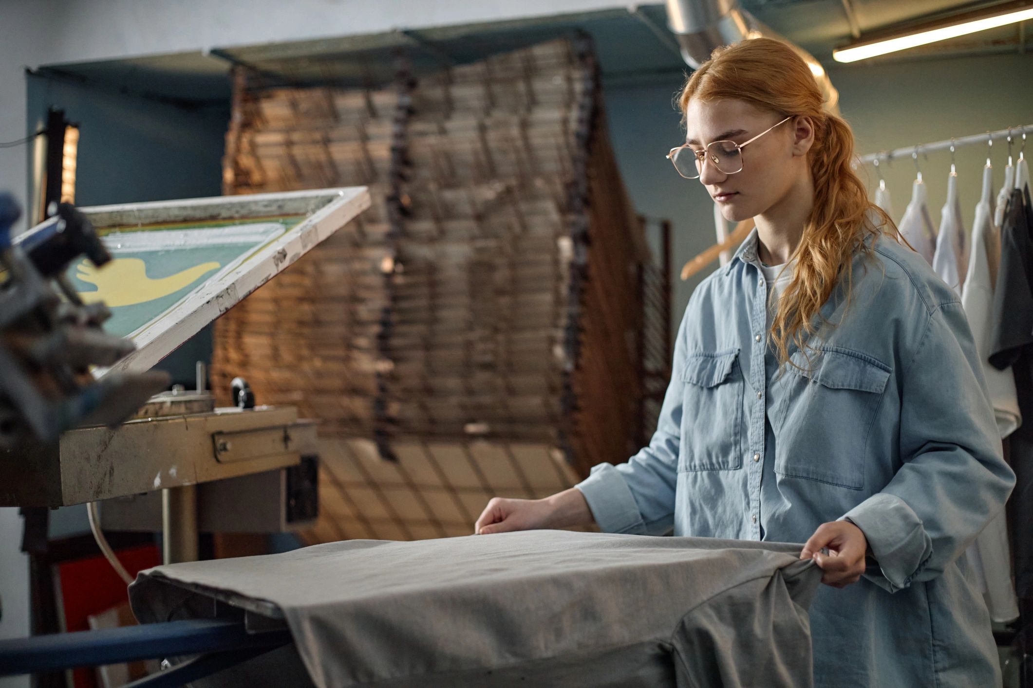 Apparel studio workspace showing garment measuring and preparation